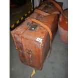 A leather suitcase.