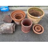 A quantity of terracotta pots, roof tiles etc