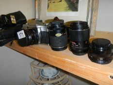 A Praktica camera, lenses etc.,