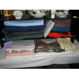 A good lot of vintage fabrics including a piece of leather.