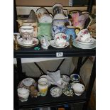 Two shelves of miscellaneous ceramics.