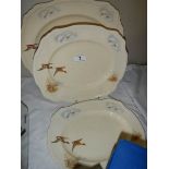 A set of three graduated Alfred Meakin meat platters depicting ducks.