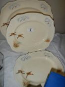 A set of three graduated Alfred Meakin meat platters depicting ducks.