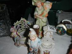 A quantity of 20th century figures.