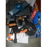 A Ryobi battery drill (no battery) and other tools.