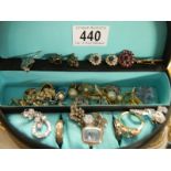 A jewellery box with rings, earrings etc.,