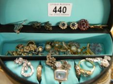 A jewellery box with rings, earrings etc.,