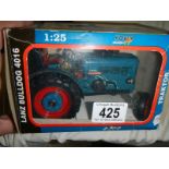 A boxed Lanz Bulldog die cast tractor.