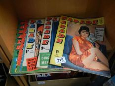 A quantity of 1960's Parade magazines.