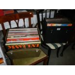 Two boxes of LP records.