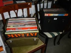 Two boxes of LP records.