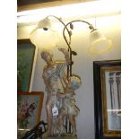 A figural two light table lamp. COLLECT ONLY.