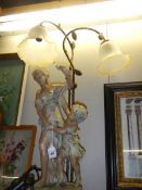 A figural two light table lamp. COLLECT ONLY.