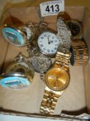 A quantity of pocket and wrist watches.
