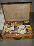 A suitcase of collectable match boxes.