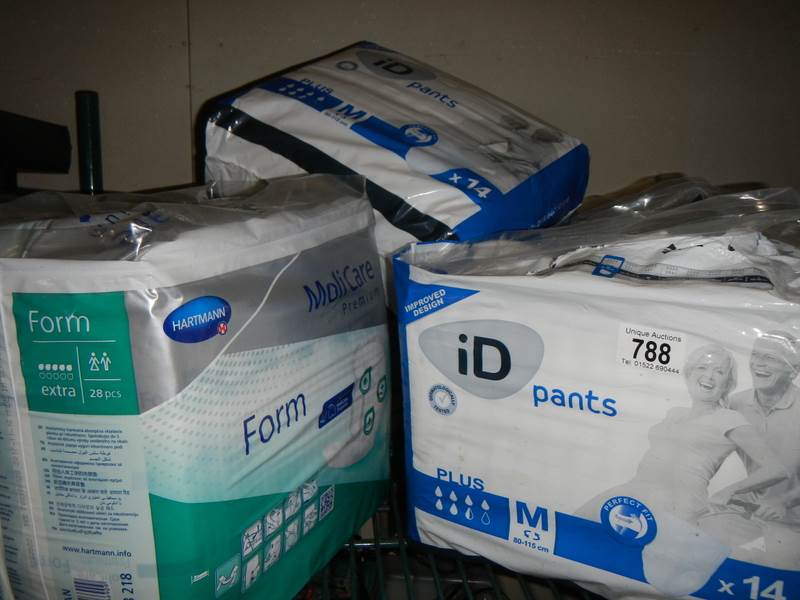 Seven packs of incontinence pads etc.,