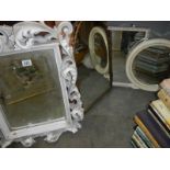 A quantity of old mirrors including brass framed.