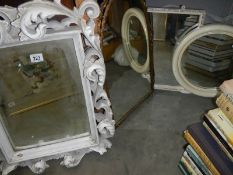 A quantity of old mirrors including brass framed.