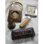 A silver photo frame, two miniatures and a snuff box.