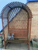 An arched garden seat (one strut on seat a/f)