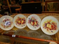 A set of four Royal Stanley Staffordshire plates all signed D Wallace.