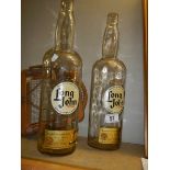 Two "Long John" Scotch whisky bottles (no contents).