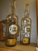 Two "Long John" Scotch whisky bottles (no contents).