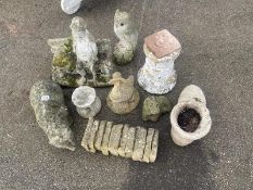 9 stone garden sculptures including owl and badger
