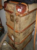 An old wood bound suitcase.