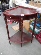 A mahogany corner table. COLLECT ONLY.