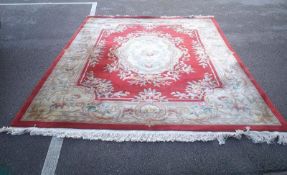 A 8ft x 10ft 100% pure wool, good quality red carpet (in need of a clean)