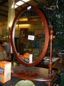 A mahogany toilet mirror. COLLECT ONLY.