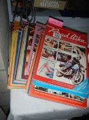 A quantity of Road Bike magazines.