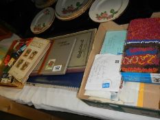 A mixed lot of stamps, match boxes etc.,