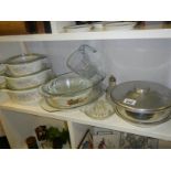 A set of graduated Pyrex lidded dishes etc.,