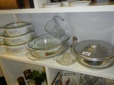 A set of graduated Pyrex lidded dishes etc.,
