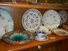 A 19th century ribbon plate and other collector's plates.