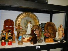 A varied selection of carved wooden items including eagle, soldier, condiment set, totem pole etc.,
