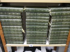 36 volumes of Charles Dickens complete works.