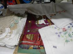 A good lot of linen including tablecloths, doilies etc.,