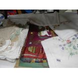 A good lot of linen including tablecloths, doilies etc.,