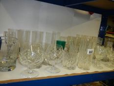 A varied selection of drinking glasses including Campari Orange.