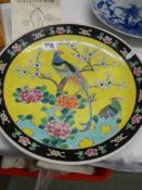 A Japanese bird decorated plate.