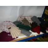 A quantity of ladies hats and gloves.