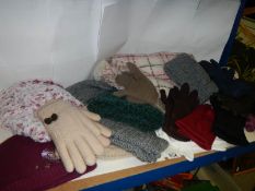 A quantity of ladies hats and gloves.