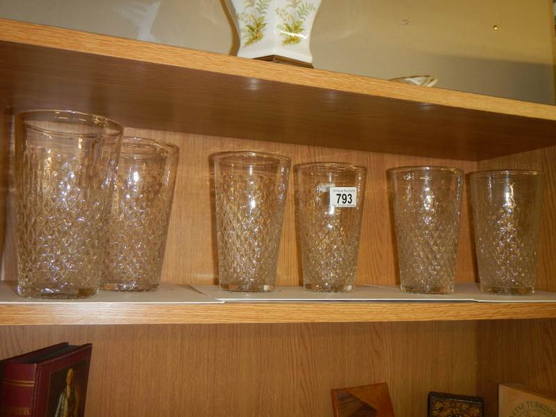 A set of six drinking glasses.