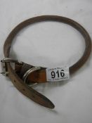 An old leather dog collar.