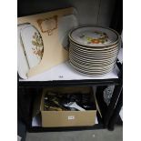 A quantity of Mountain Wood collection trellis blossom dinner plates and a box of cutlery.