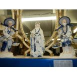 Three Leonardo collection blue and white Chinese figures.