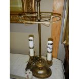 A brass table lamp.